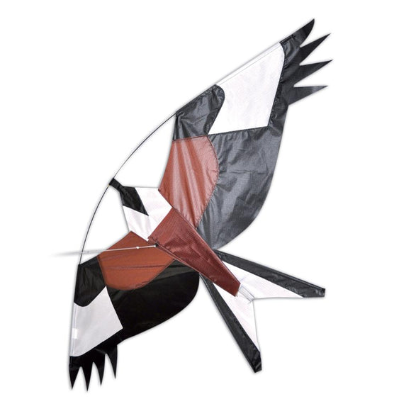 Brown hawk kite against a blue sky.