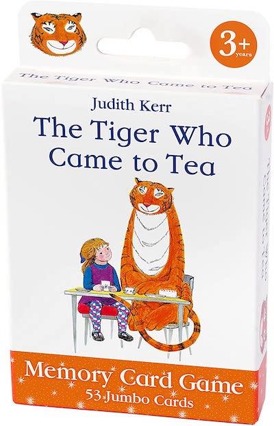 Rectangular white box with an orange band at the foot and an illustration of an orange striped tiger sitting with a girl at a table. The wording at the foot reads "Memory Card Game. 53 Jumbo Cards".