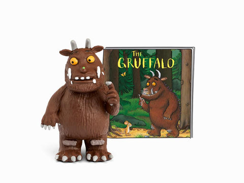 Brown Gruffalo figure standing in front of the Gruffalo booklet.