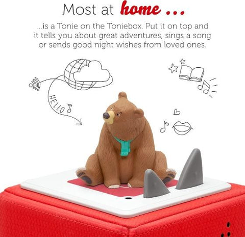 Seated bear figure from the book 'We're Going on A Bear Hunt' atop a red Tonibox.