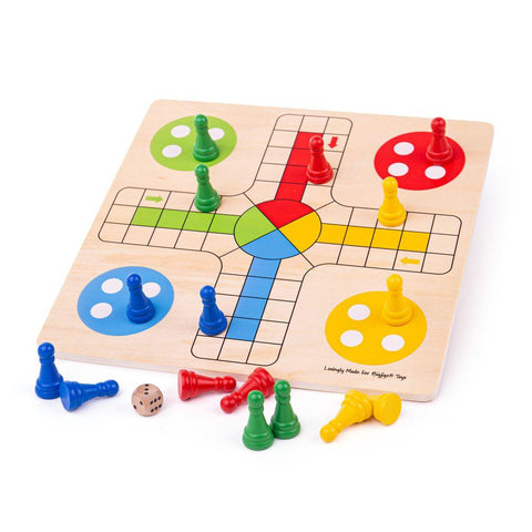 Wooden board with colourful pattern and colourful wooden pieces.