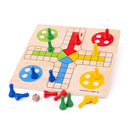 Wooden board with colourful pattern and colourful wooden pieces.
