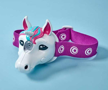 Unicorn head torch with purplish head-band on a blue background.