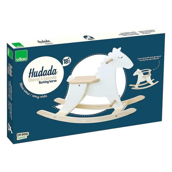Dark blue box containing the white wooden rocking horse. White background.