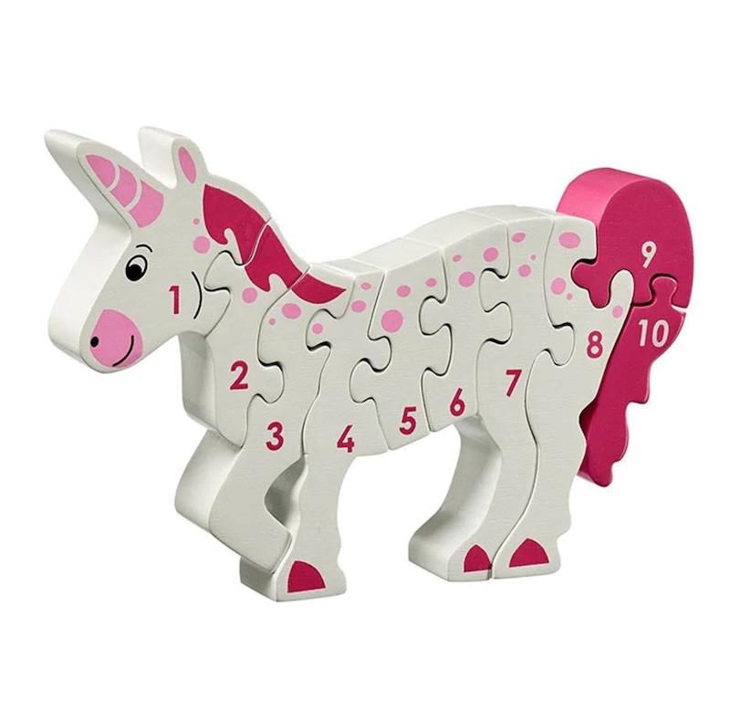 Pink and white wooden Unicorn jigsaw puzzle.