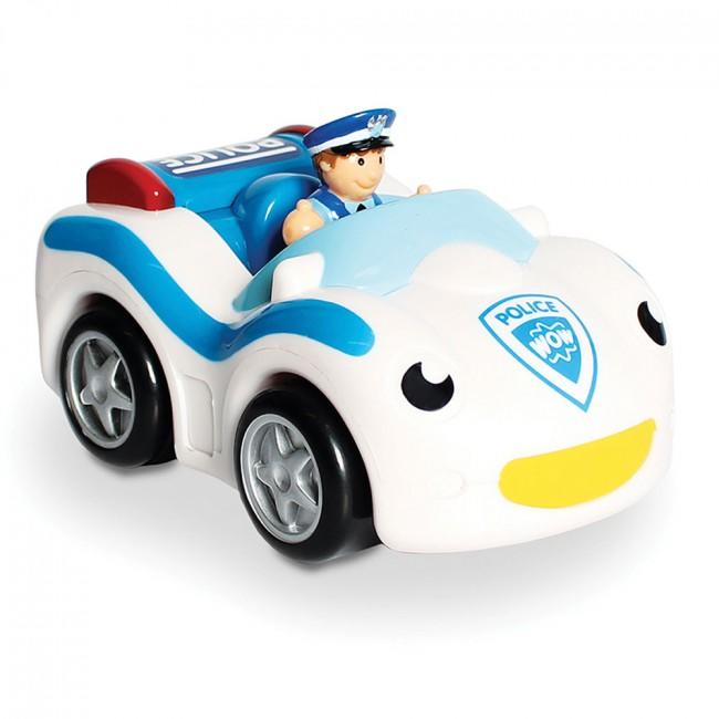 Toy police car with toy policeman.