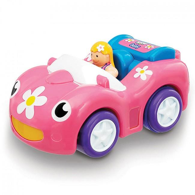 Toy car with daisy pattern and small doll.