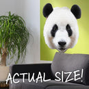 Large panda head jigsaw on wall to show large scale.